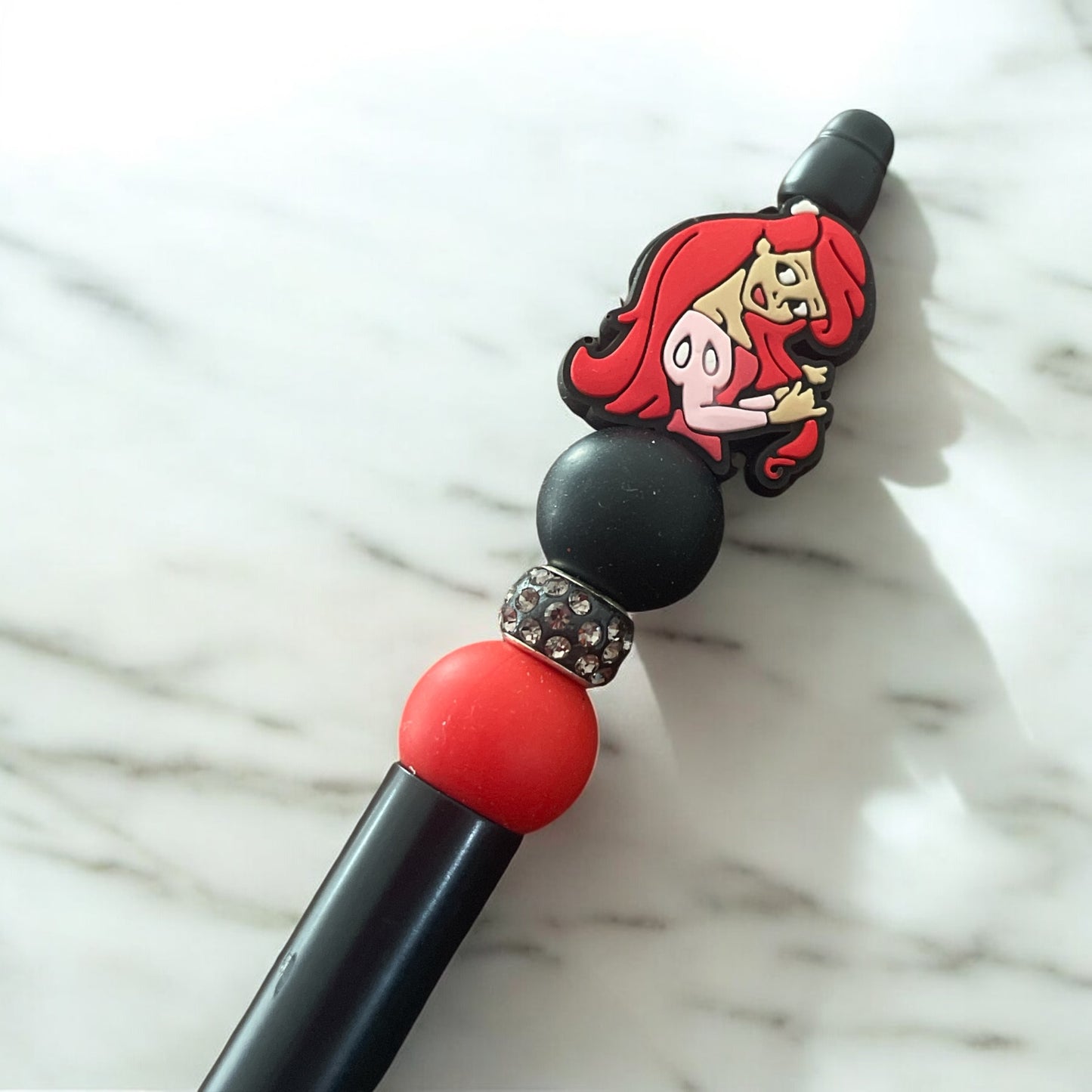 Black Ink Pen with Ariel Focal Bead – Red & Black Rhinestone Accents
