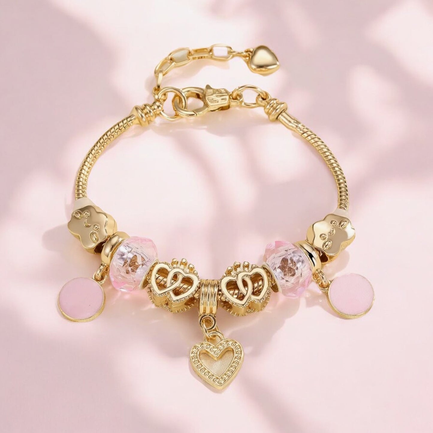 Golden Heart Charm Bracelet with Pink Accents