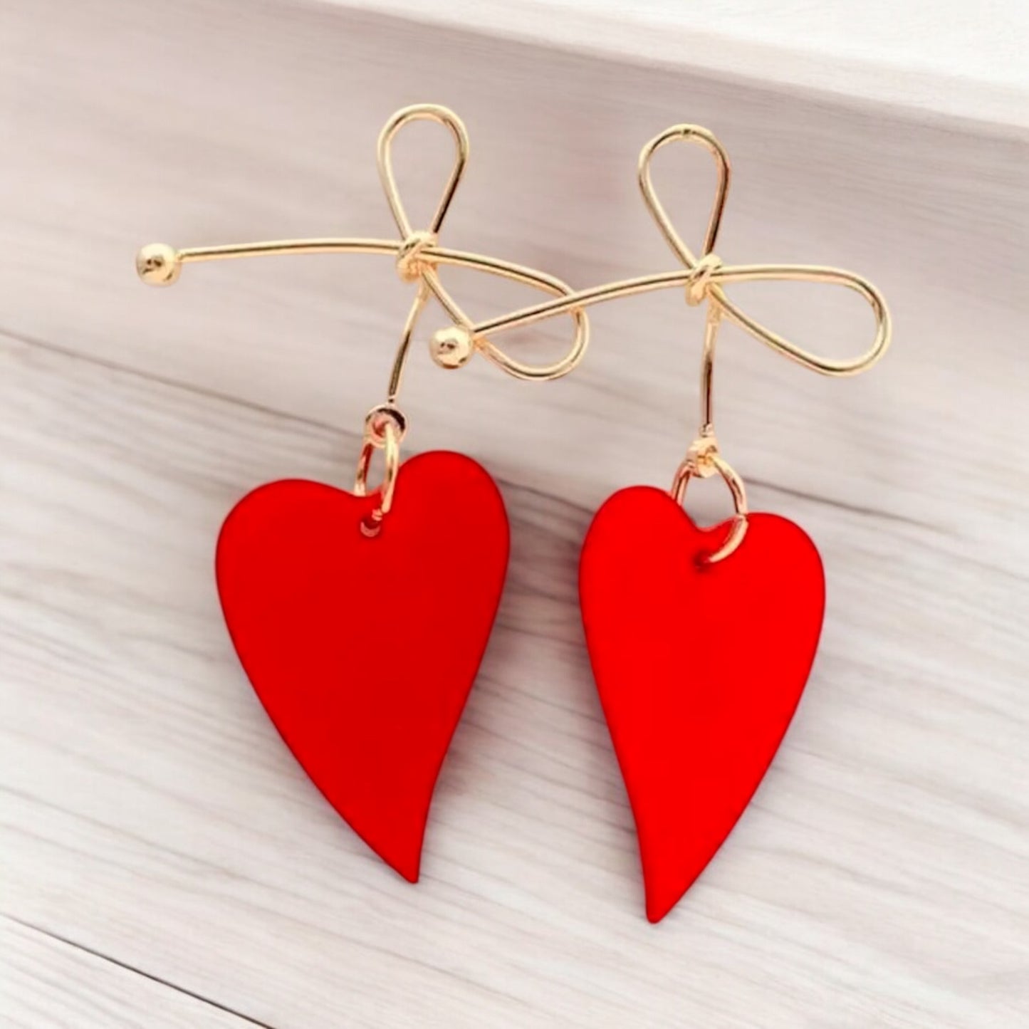 Red Heart Drop Earrings with Gold Bow Accent