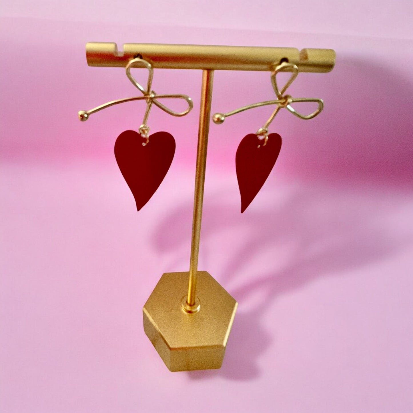 Red Heart Drop Earrings with Gold Bow Accent