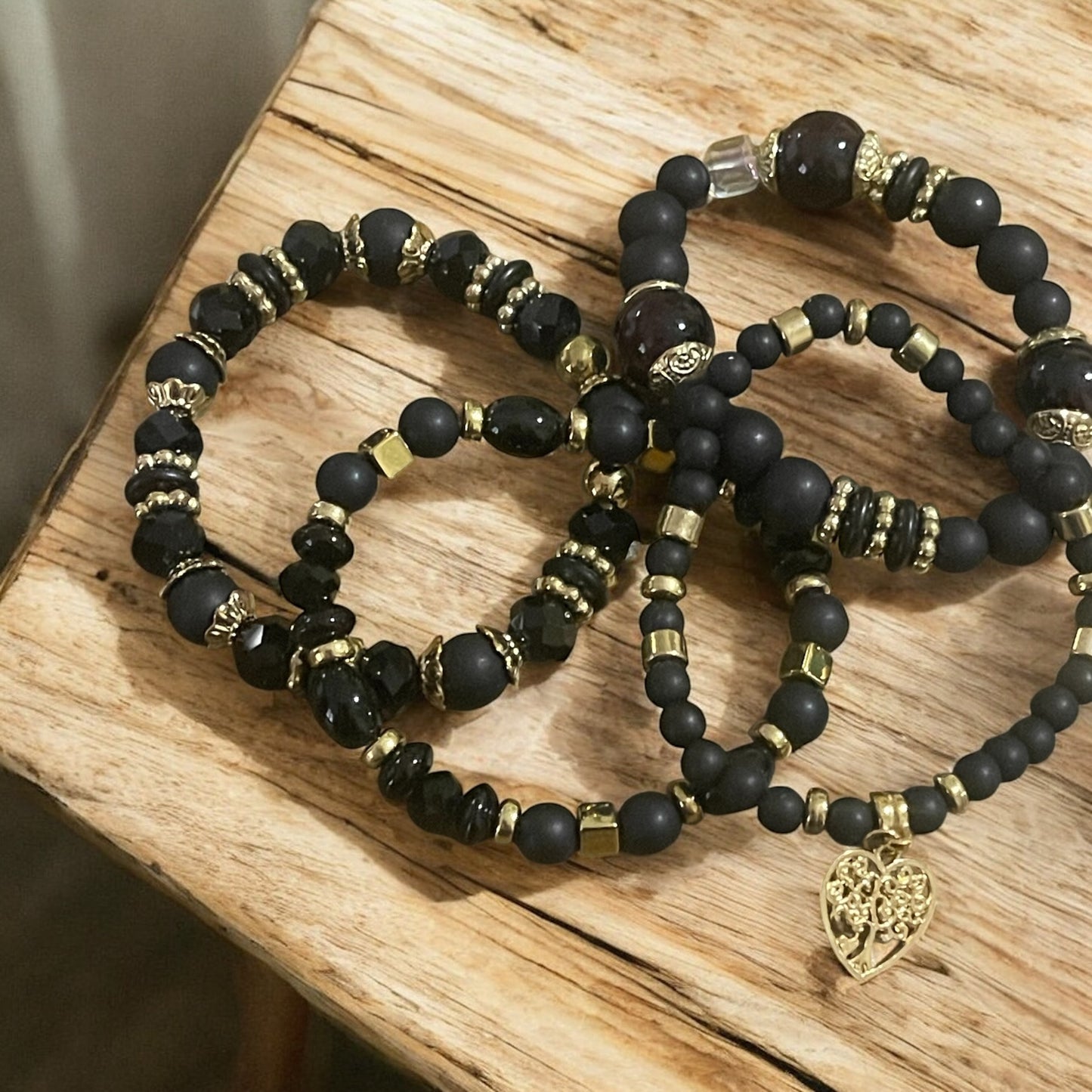 Black Radiance 4-Piece Bracelet Stack – Black with Gold Accents