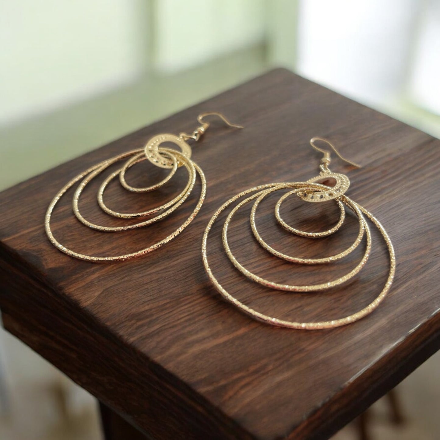 Cascading Gold Four-Hoop Drop Earrings