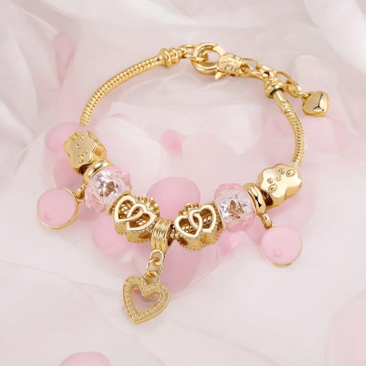 Golden Heart Charm Bracelet with Pink Accents