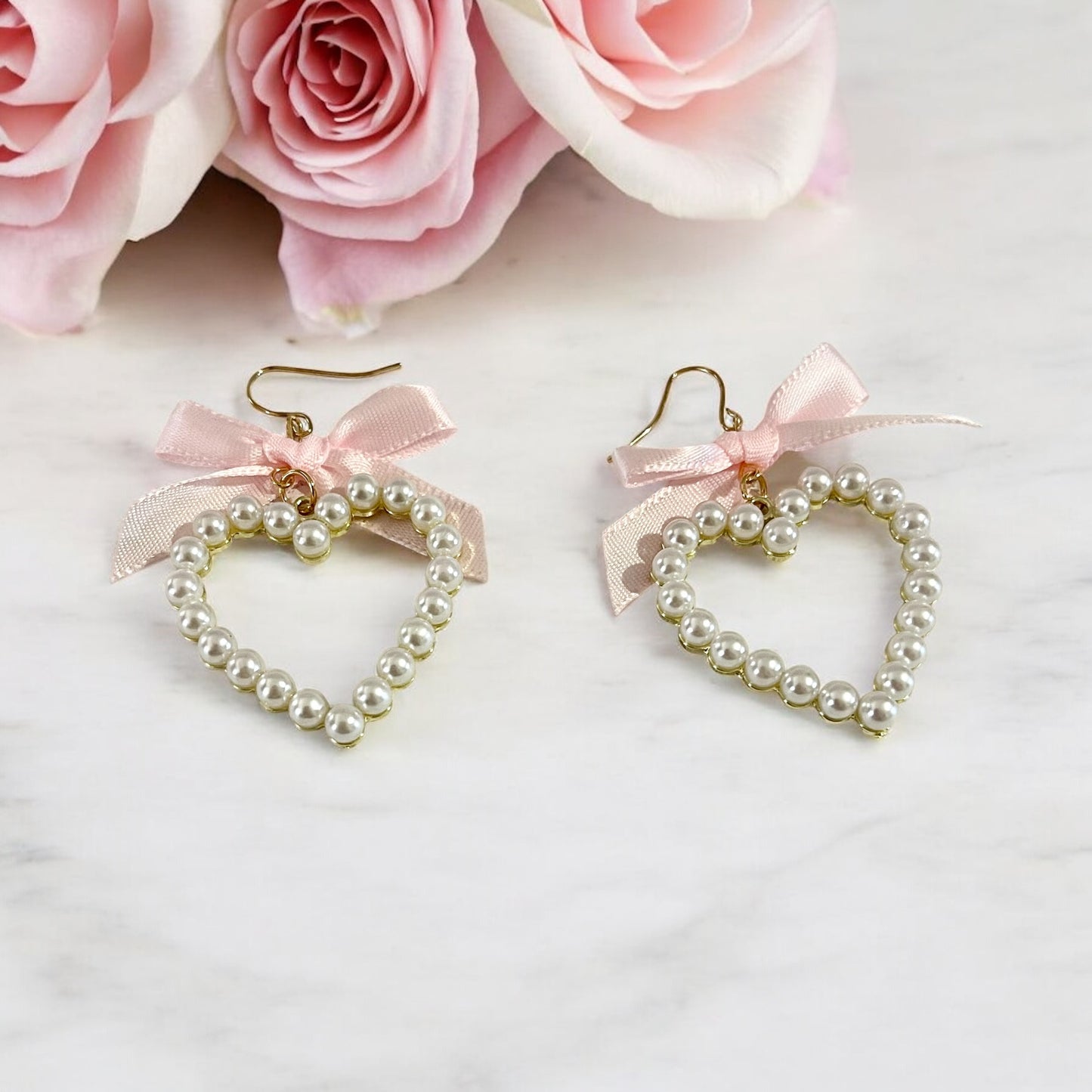 Heart-Shaped Pearl Earrings with Pink Ribbon Bows